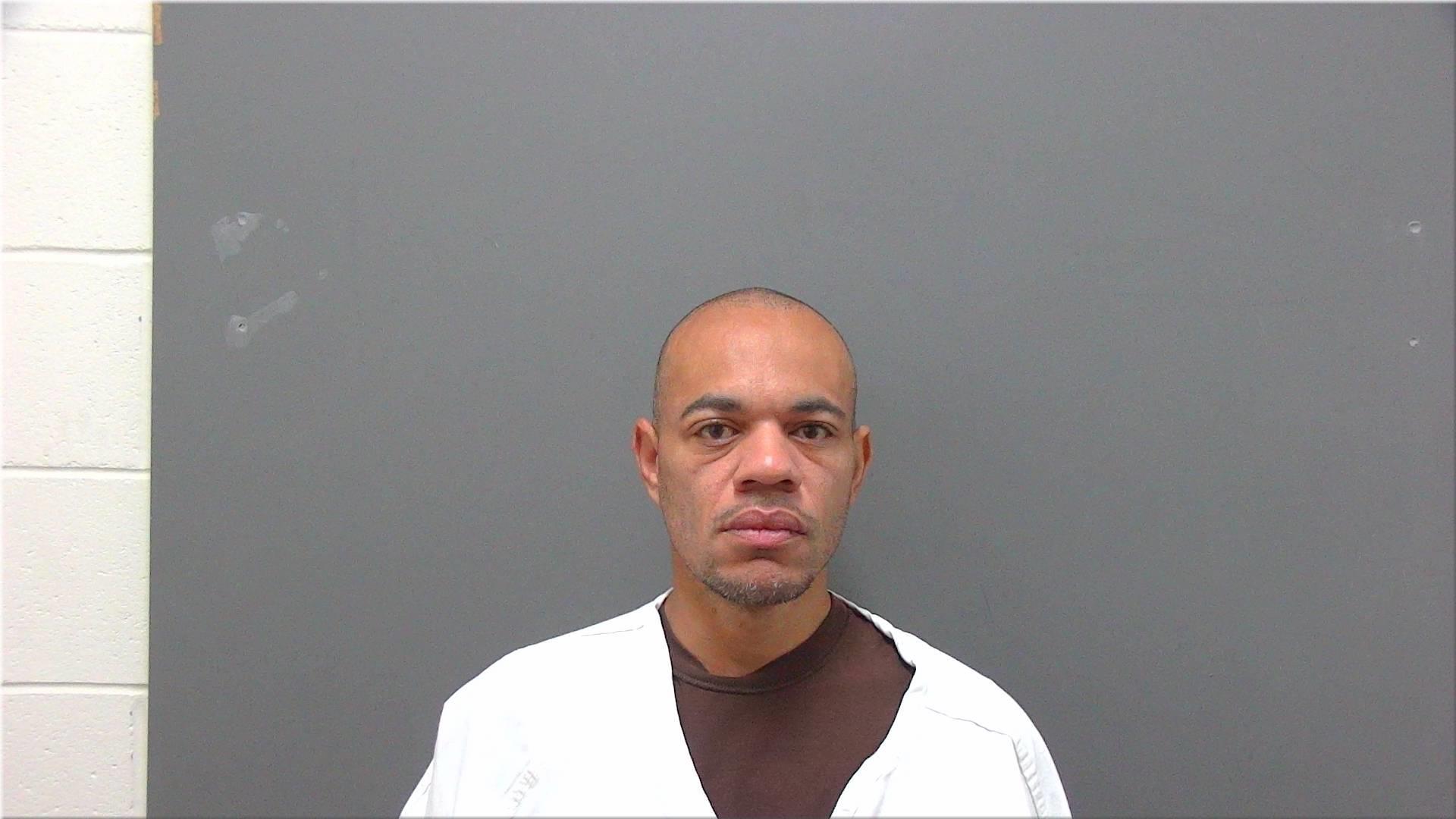 Mugshot of Goston, Fhilip K