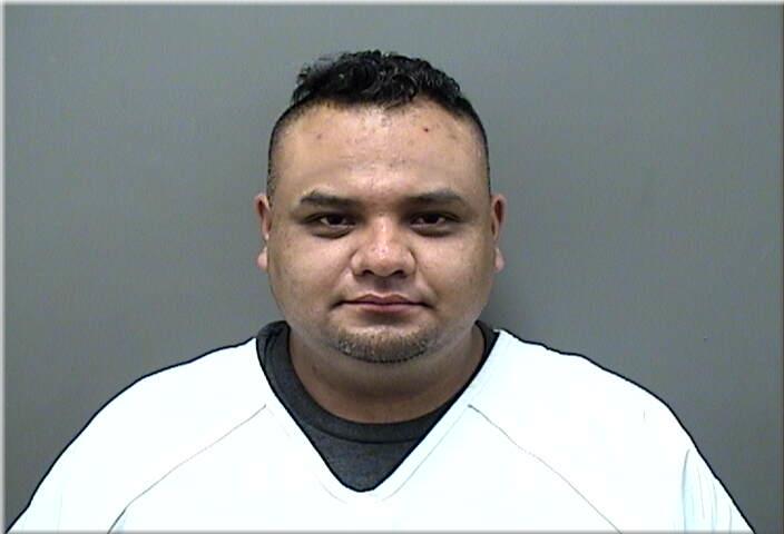 Mugshot of Flores, Juan M