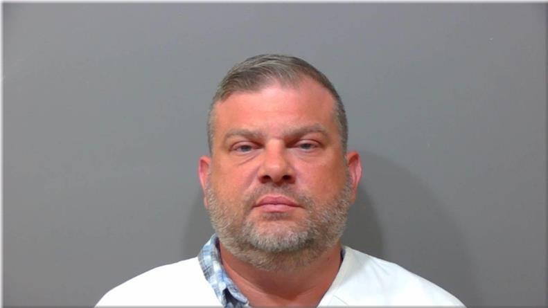 Mugshot of Lew, Michael