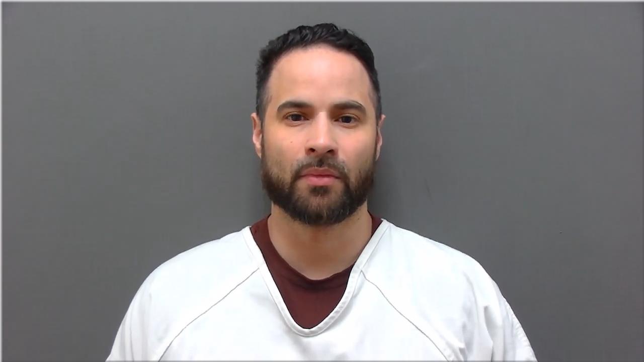 Mugshot of Rocha, Adam
