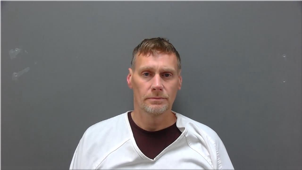 Mugshot of Leach, Justin Michael