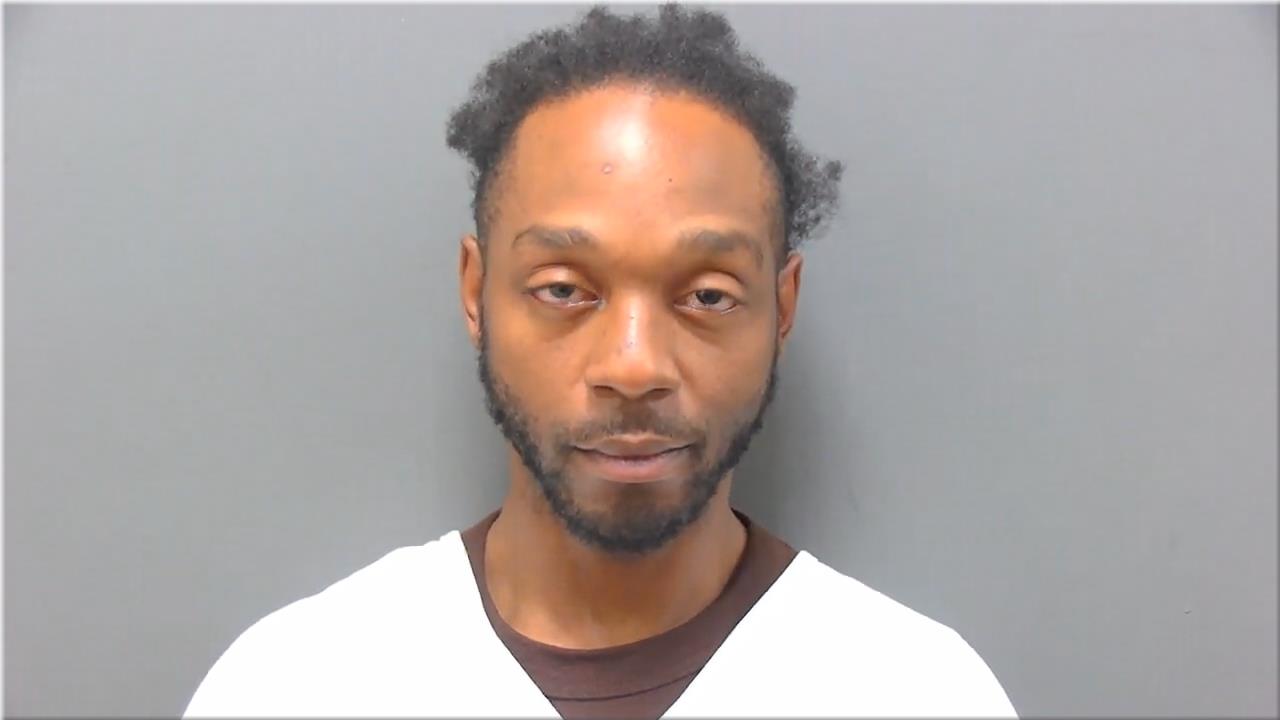 Mugshot of Davis, Raymont