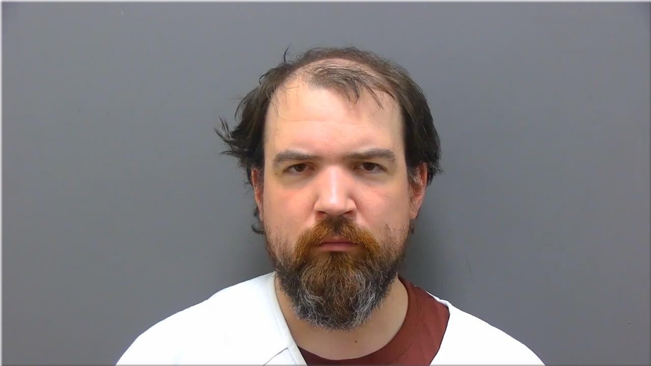 Mugshot of Jann, Ryan Winslow