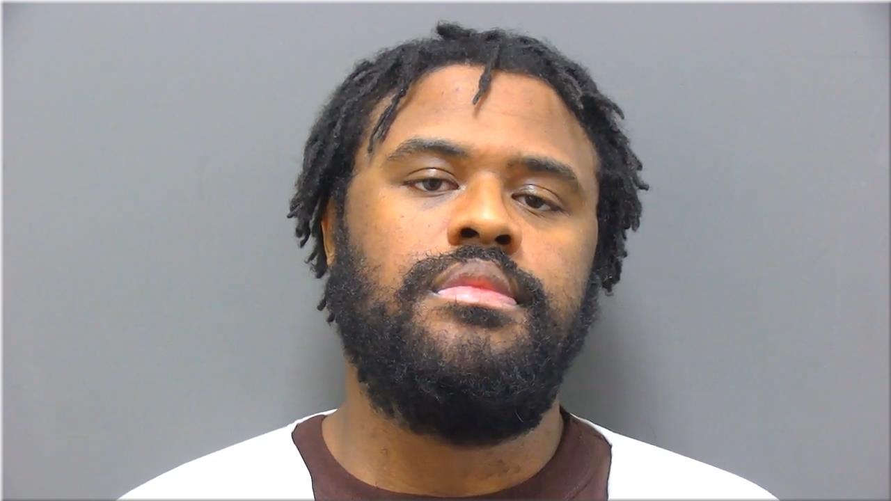 Mugshot of Cousins, Kamonze Rasheed