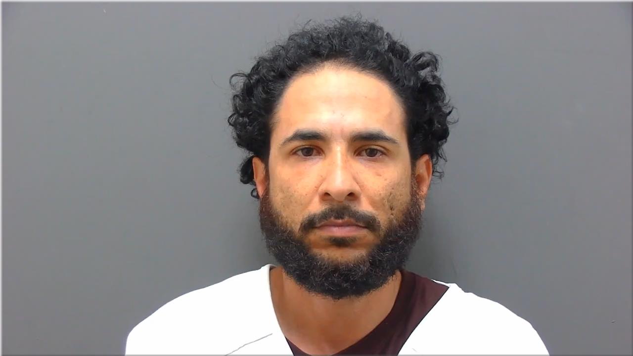 Mugshot of Melendez Roman, Adalberto