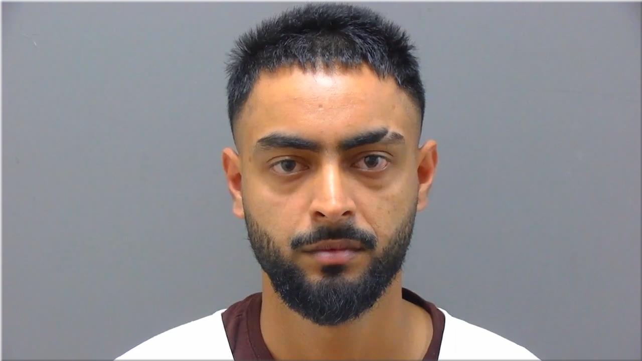 Mugshot of Singh, Manvir