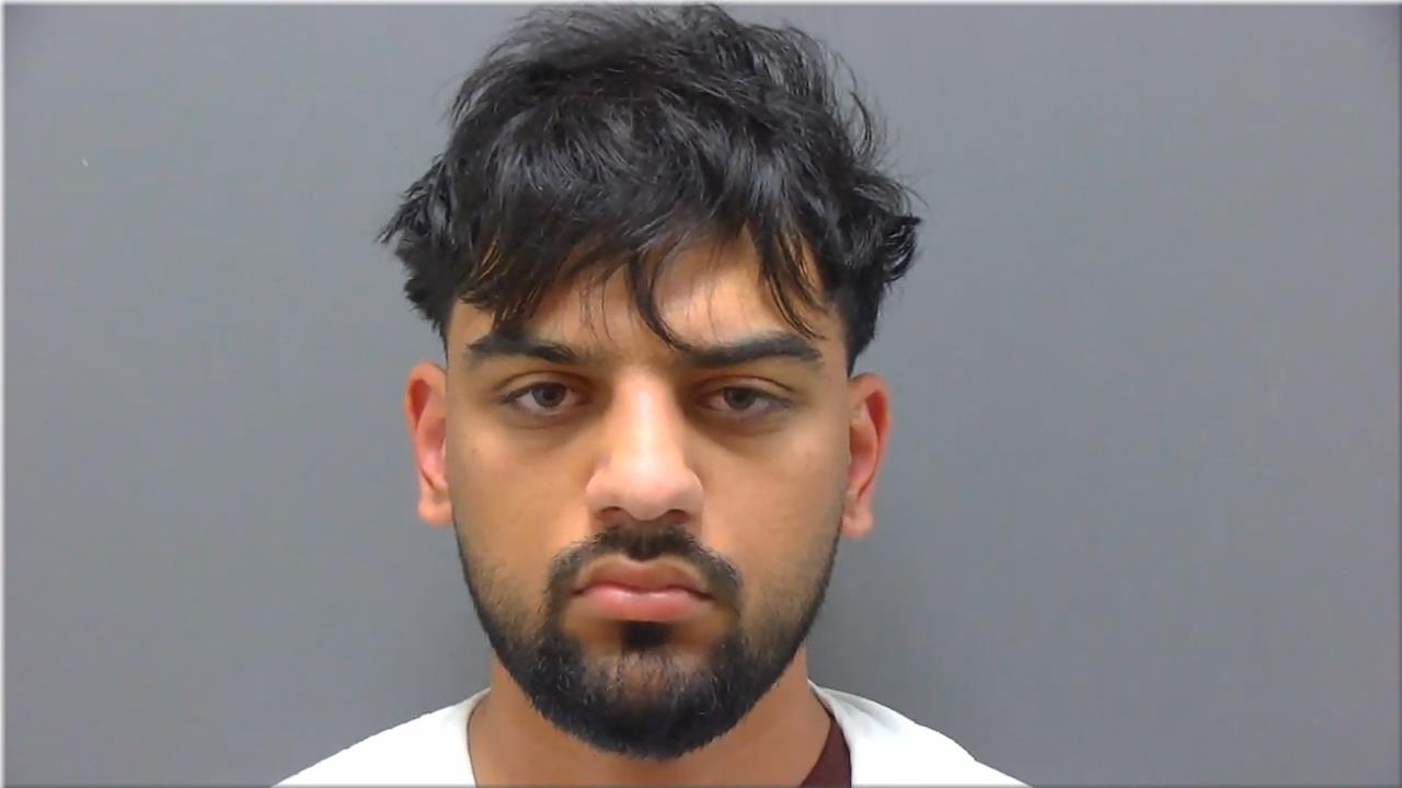 Mugshot of Singh, Manmit